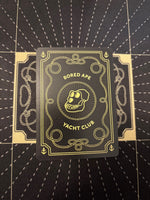 
              Mudwater #054 Never Alone actual card back, photographed October 24, 2026
            
